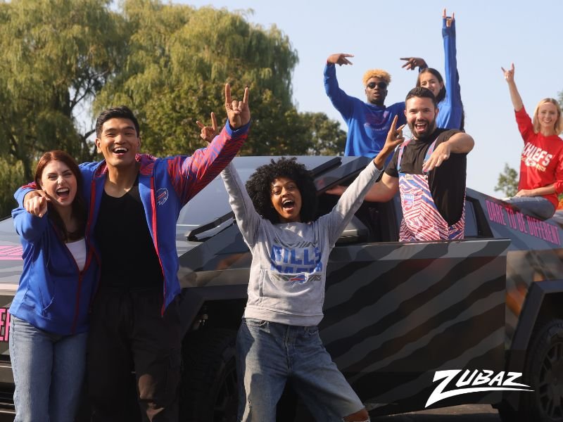 Group of fans wearing Zubaz zebra print gear at a tailgate