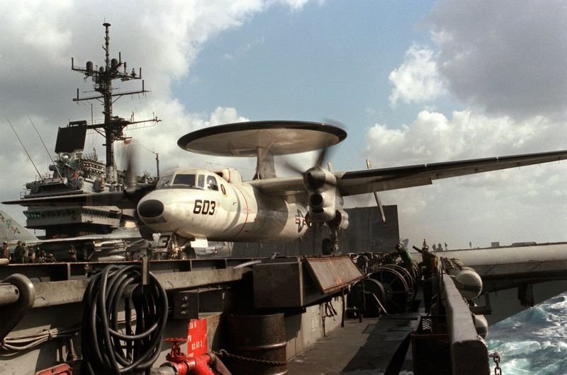 E-2 Hawkeye aircraft on the flight deck of USS Saratoga, the carrier that launched the F-14 intercept