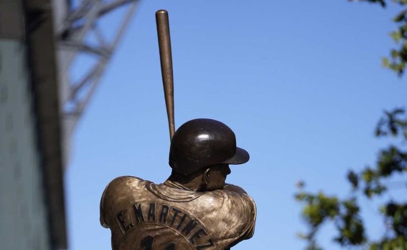Bronze statue of Edgar Martinez mid-swing outside T-Mobile Park commemorating The Double