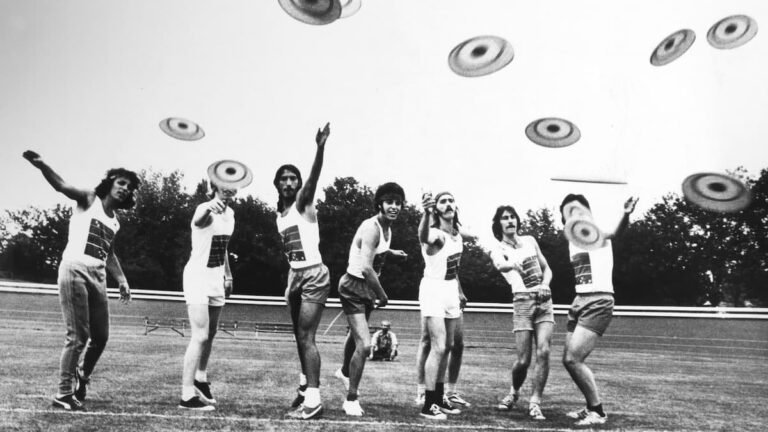 English college team throwing frisbees in a 1966 flying disc craze photo