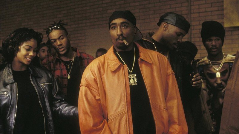 Tupac Shakur as Birdie in Above the Rim 1994 orange leather jacket cigar scene