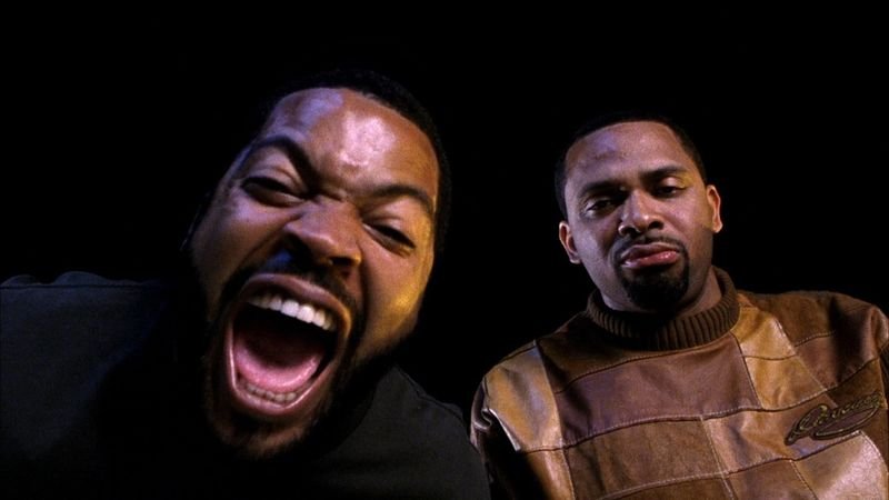 Ice Cube and Mike Epps laughing in a scene from Friday After Next