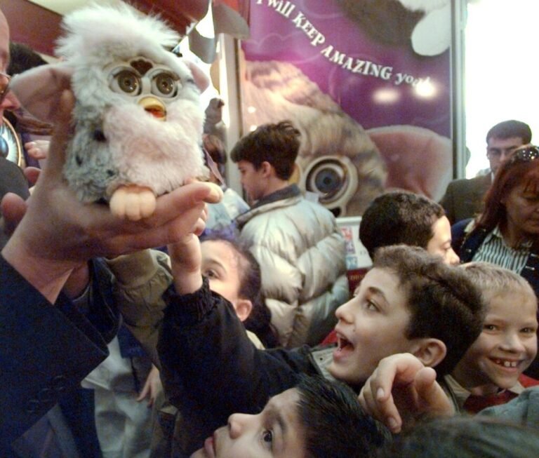 Kids crowd around Furbies at FAO Schwarz during the 1998 holiday shopping frenzy