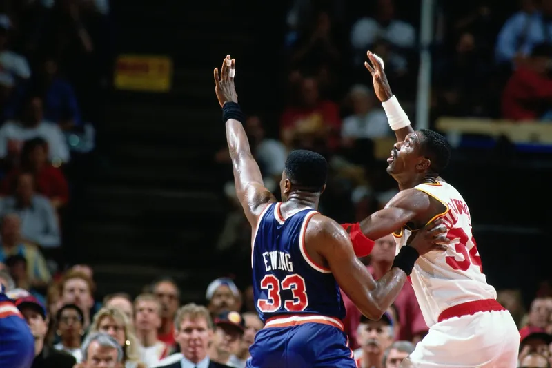 Hakeem Olajuwon shoots over Patrick Ewing during the 1994 NBA Finals between the Houston Rockets and New York Knicks