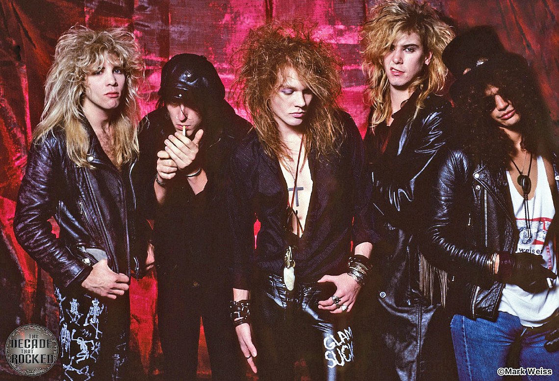 Guns N' Roses — Duff McKagan, Izzy Stradlin, Axl Rose, Steven Adler, and Slash — in a 1987 band portrait