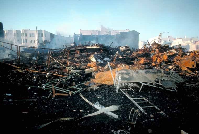 Smoldering ruins of a burned Marina District building after the 1989 earthquake fire in San Francisco