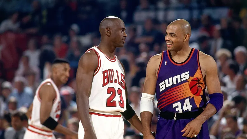 Michael Jordan and Charles Barkley, fellow members of the 1984 NBA Draft class that also produced Hakeem Olajuwon