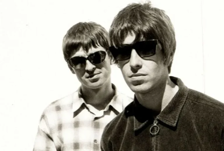 Liam and Noel Gallagher of Oasis in a 1994 press photo during the Creation Records era