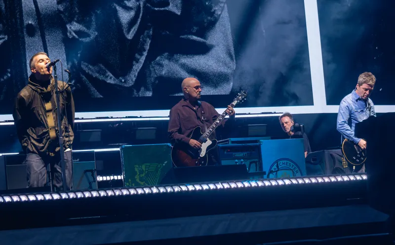 Oasis performing live at the opening night of the Live 25 reunion tour in Cardiff in 2025
