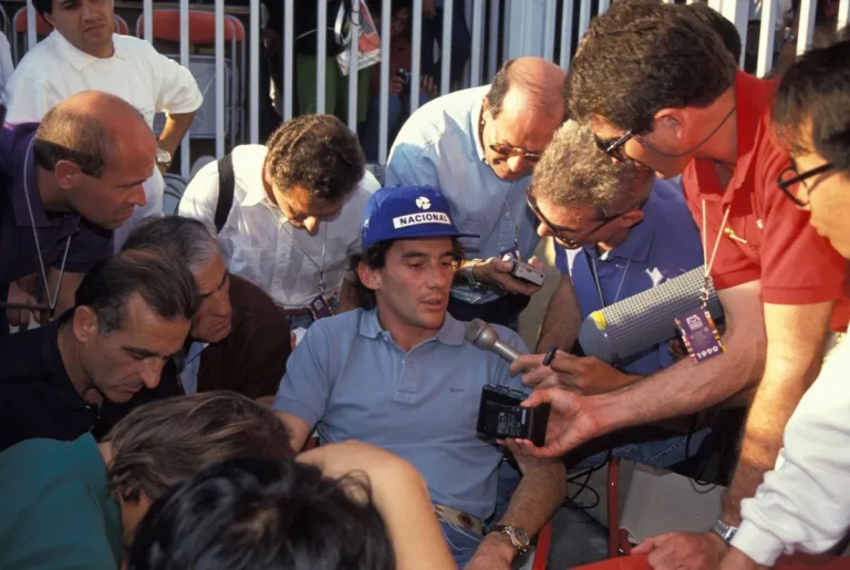 Ayrton Senna crashing into Alain Prost at the first corner of the 1990 Japanese Grand Prix at Suzuka