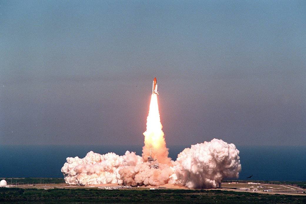 Space Shuttle Discovery lifting off from Launch Pad 39B at Kennedy Space Center on October 29, 1998, carrying Senator John Glenn on the STS-95 mission