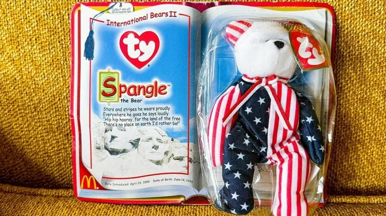 Spangle the Bear Teenie Beanie Baby sealed in its original McDonald's Happy Meal packaging
