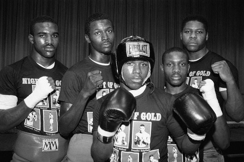 Tyrell Biggs poses with fellow 1984 Olympic boxing gold medalists including Evander Holyfield and Pernell Whitaker