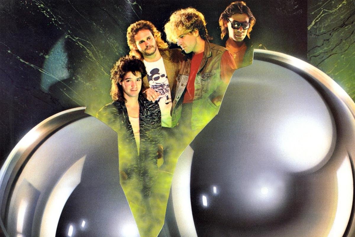 Van Halen 5150-era promotional portrait featuring Sammy Hagar, Eddie Van Halen, Alex Van Halen, and Michael Anthony