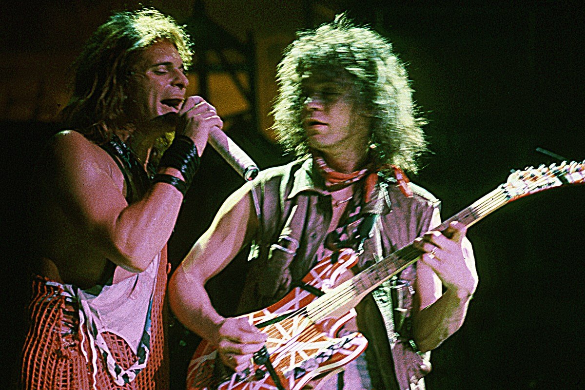 David Lee Roth singing alongside Eddie Van Halen on guitar during a 1984 Van Halen concert