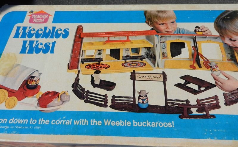 Weebles West playset box art with saloon and covered wagon